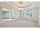 Formal dining area featuring a large window, recessed lighting, and neutral wall color at 5059 Winding Hills Lane Ln, Woodstock, GA 30189