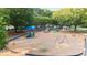Community playground with various play structures, swings, and a gazebo for Gathering fun at 5059 Winding Hills Lane Ln, Woodstock, GA 30189