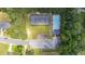Community amenities with an aerial view of the pool, tennis court, parking area, and playground at 706 Hillmont Dr, Loganville, GA 30052