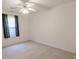 Bedroom with natural light from a window with dark curtains, plus a ceiling fan at 706 Hillmont Dr, Loganville, GA 30052