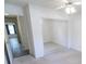 Cozy bedroom with mirrored closet doors, ceiling fan and attached room at 706 Hillmont Dr, Loganville, GA 30052