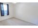 Bedroom with natural light from a window with dark curtains, plus a ceiling fan at 706 Hillmont Dr, Loganville, GA 30052