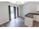 Dining area with sliding glass doors located next to kitchen at 706 Hillmont Dr, Loganville, GA 30052