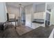 Bright kitchen with white cabinets, stainless steel appliances, and hardwood floors at 706 Hillmont Dr, Loganville, GA 30052