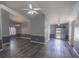Expansive living room features hardwood floors, gray walls, and custom moulding at 706 Hillmont Dr, Loganville, GA 30052