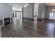 Spacious living room featuring luxury vinyl plank flooring, neutral tones and a fireplace at 706 Hillmont Dr, Loganville, GA 30052