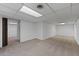 Spacious finished basement with carpeting and access to another room at 880 Winfield Sw Ct, Marietta, GA 30060
