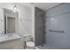 Bathroom featuring a walk-in shower and neutral grey walls at 880 Winfield Sw Ct, Marietta, GA 30060