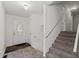 Bright entryway with a staircase and a decorative glass front door at 880 Winfield Sw Ct, Marietta, GA 30060