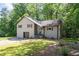 Charming home with a well-maintained lawn and beautiful landscaping at 880 Winfield Sw Ct, Marietta, GA 30060