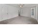 Main bedroom features neutral carpet and an en suite bathroom with a shower at 880 Winfield Sw Ct, Marietta, GA 30060