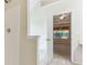 White tiled shower is connected to an opening to the bedroom at 2410 Napa Valley Dr, Villa Rica, GA 30180