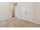 Bedroom with carpet flooring, and a closet at 2410 Napa Valley Dr, Villa Rica, GA 30180