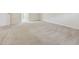 Spacious bedroom featuring neutral walls and carpet flooring at 2410 Napa Valley Dr, Villa Rica, GA 30180