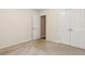Bedroom with carpet flooring, and a closet at 2410 Napa Valley Dr, Villa Rica, GA 30180