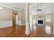 Spacious living room with hardwood floors and a fireplace at 2410 Napa Valley Dr, Villa Rica, GA 30180