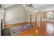 Spacious living room with hardwood floors, fireplace, and vaulted ceilings at 2410 Napa Valley Dr, Villa Rica, GA 30180