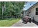 Inviting backyard features a well-maintained lawn and an outdoor dining area at 2936 Randolph Ne Rd, Atlanta, GA 30345