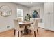Light-filled dining room featuring a round table and modern artwork at 2936 Randolph Ne Rd, Atlanta, GA 30345