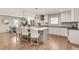 Spacious kitchen with large island, stainless steel appliances, and modern lighting at 2936 Randolph Ne Rd, Atlanta, GA 30345
