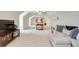 Spacious upstairs living room featuring a vaulted ceiling, carpet flooring and modern furnishings at 2936 Randolph Ne Rd, Atlanta, GA 30345