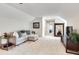 Upper living room has vaulted ceilings, a sectional sofa, and a large decorative mirror at 2936 Randolph Ne Rd, Atlanta, GA 30345