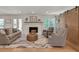 Inviting living room with fireplace, barn doors, and plush seating at 2936 Randolph Ne Rd, Atlanta, GA 30345