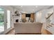 Cozy living room featuring a fireplace, built-in shelves, and a sliding barn door at 2936 Randolph Ne Rd, Atlanta, GA 30345
