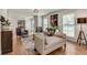 Bright living room with hardwood floors, a decorative painting and elegant furnishings at 2936 Randolph Ne Rd, Atlanta, GA 30345