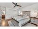 Comfortable main bedroom with ceiling fan, neutral colors, and ensuite bathroom at 2936 Randolph Ne Rd, Atlanta, GA 30345