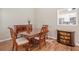 Elegant dining room with wooden furniture and views into the kitchen at 3540 Pilgrim Mill Rd, Cumming, GA 30041