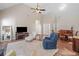 Spacious living room with high ceilings, plush carpet, and ample seating at 3540 Pilgrim Mill Rd, Cumming, GA 30041
