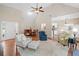 Open-concept living room with a dining area, kitchen view and cozy seating at 3540 Pilgrim Mill Rd, Cumming, GA 30041