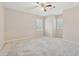 Bedroom with neutral walls, shutters, and plush carpet at 626 Cheatham Sw Dr, Marietta, GA 30064