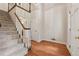 Inviting foyer with hardwood floors, staircase, and neutral paint, creating a warm and welcoming atmosphere at 626 Cheatham Sw Dr, Marietta, GA 30064