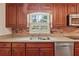 Well-appointed kitchen with stainless steel appliances, granite countertops, and ample cabinet space at 626 Cheatham Sw Dr, Marietta, GA 30064