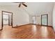 Spacious living room with hardwood floors, vaulted ceiling, and ample natural light at 626 Cheatham Sw Dr, Marietta, GA 30064
