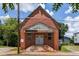 Unique brick building with a covered entryway and potential for renovation at 88 Martin Se Ave, Atlanta, GA 30315
