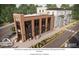 Rendering of a mixed-use property with brick facade, showcasing commercial space at 88 Martin Se Ave, Atlanta, GA 30315