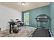 Bonus room that can be used as a gym or playroom with hardwood flooring and a window at 1019 Avonley Creek Trce, Sugar Hill, GA 30518