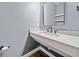 Stylish bathroom features a marble countertop, modern sink, and contemporary fixtures at 214 Harmony Lake Dr, Canton, GA 30115