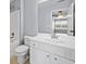 Bathroom with a shower-tub combo and single sink vanity at 214 Harmony Lake Dr, Canton, GA 30115