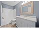 Bathroom featuring white vanity with updated fixtures and shower-tub combination at 214 Harmony Lake Dr, Canton, GA 30115