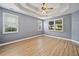 Bright bedroom with abundant natural light showcases multiple windows and neutral paint at 214 Harmony Lake Dr, Canton, GA 30115
