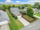 Beautifully landscaped home featuring a manicured lawn and backyard at 214 Harmony Lake Dr, Canton, GA 30115