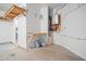 Clean garage space complete with shelving and tankless water heater at 214 Harmony Lake Dr, Canton, GA 30115