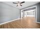 Open-concept living room featuring hard wood floors, gray walls and white trim at 214 Harmony Lake Dr, Canton, GA 30115