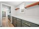 Pantry with modern cabinets and a view of the kitchen at 214 Harmony Lake Dr, Canton, GA 30115