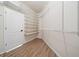 Well-organized walk-in closet with custom shelving and ample storage space at 214 Harmony Lake Dr, Canton, GA 30115