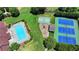 Aerial view of pool, playground, basketball court, and tennis courts at the Springmonte community at 2625 Harbor Point Ct, Cumming, GA 30041